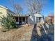View of the detached garage and additional storage or workshop space, in the backyard at 3751 N Sadlier Dr, Indianapolis, IN 46226