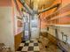 Basement with water heater and shelving at 3751 N Sadlier Dr, Indianapolis, IN 46226