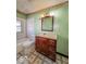 Bathroom features a toilet, vanity and shower at 3751 N Sadlier Dr, Indianapolis, IN 46226