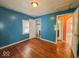 View of bedroom showing a doorway and two windows at 3751 N Sadlier Dr, Indianapolis, IN 46226