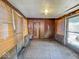 View of sunroom with paneled walls and windows at 3751 N Sadlier Dr, Indianapolis, IN 46226