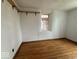 A empty bedroom featuring hardwood floors at 4534 N State Road 9, Anderson, IN 46012