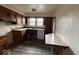 Kitchen with wood cabinets and an adjacent eating area at 4534 N State Road 9, Anderson, IN 46012