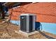 Exterior shot of a modern air conditioning unit, ensuring efficient cooling for comfortable living in home at 493 N Avon Ave, Avon, IN 46123