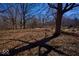 Fenced-in backyard features mature trees and plenty of space for outdoor activities at 493 N Avon Ave, Avon, IN 46123