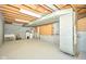 Unfinished basement with exposed duct work, utility sink, and water heaters, ready for customization at 493 N Avon Ave, Avon, IN 46123