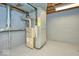 Spacious unfinished basement with concrete flooring and exposed ceiling, showing the home's mechanics at 493 N Avon Ave, Avon, IN 46123