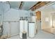 This basement features mechanical equipment and water filtration at 493 N Avon Ave, Avon, IN 46123