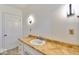 The bathroom features a granite vanity, with a bright white sink and modern vanity lighting at 493 N Avon Ave, Avon, IN 46123