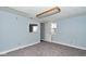 Cozy bedroom features light blue walls, plush carpeting, and views into other rooms at 493 N Avon Ave, Avon, IN 46123
