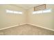 This room is freshly painted, and features carpeted floors and sunlit windows providing natural light at 493 N Avon Ave, Avon, IN 46123