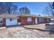 Brick home exterior on a sunny day, showcasing the front yard and curb appeal at 493 N Avon Ave, Avon, IN 46123