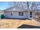 View of home featuring vinyl siding, updated windows, and concrete patio, offering modern comfort at 493 N Avon Ave, Avon, IN 46123