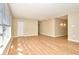 Open living room showcasing the wood-look floors and neutral tones at 493 N Avon Ave, Avon, IN 46123