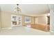 Inviting living room featuring a combination of tile and hardwood flooring with an abundance of natural light at 493 N Avon Ave, Avon, IN 46123