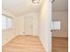 Light-filled room with wood-look flooring and a bright white interior at 493 N Avon Ave, Avon, IN 46123