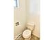 A toilet is visible within the bathroom, with a tiled floor at 493 N Avon Ave, Avon, IN 46123