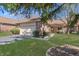 Charming single-Gathering home showcasing a manicured lawn and a two-car garage with an inviting brick facade at 5004 Boardwalk Pl, Indianapolis, IN 46220
