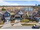 Beautiful aerial view of the home showcasing a landscaped lawn, a pond nearby, and the surrounding neighborhood at 553 Farnham Dr, Westfield, IN 46074