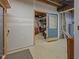 Unfinished basement with door leading to utility area; customize this blank space at 553 Farnham Dr, Westfield, IN 46074