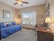 Bedroom with desk, large window, ceiling fan, and day bed at 553 Farnham Dr, Westfield, IN 46074
