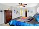 Well-lit bedroom featuring a spacious closet at 5772 Jamestown Square Ln, Indianapolis, IN 46234