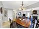 Dining area with view into living room and modern decor at 5772 Jamestown Square Ln, Indianapolis, IN 46234