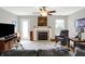 Living room with neutral decor and fireplace at 5772 Jamestown Square Ln, Indianapolis, IN 46234