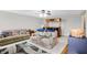 Cozy living room with comfortable seating, wooden bar, and warm ambiance for relaxation at 5772 Jamestown Square Ln, Indianapolis, IN 46234