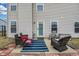 Inviting patio with stylish furniture, perfect for relaxing and enjoying the outdoor ambiance at 5772 Jamestown Square Ln, Indianapolis, IN 46234