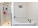 Modern bathroom showcasing a glass-enclosed shower and soaking tub at 6199 N Caraway Dr, McCordsville, IN 46055
