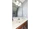 Clean bathroom featuring a marble countertop and a decorative mirror at 6199 N Caraway Dr, McCordsville, IN 46055