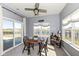 Cozy dining nook featuring a view of the backyard pond with a sliding glass door at 6199 N Caraway Dr, McCordsville, IN 46055