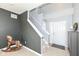 Inviting entryway featuring a stairway, stylish decor, and a glimpse of the front door at 6199 N Caraway Dr, McCordsville, IN 46055