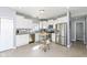 Bright kitchen with stainless steel appliances, white cabinets, and tile flooring, perfect for cooking at 6199 N Caraway Dr, McCordsville, IN 46055