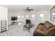 Comfortable living room with plenty of natural light and neutral carpeting at 6199 N Caraway Dr, McCordsville, IN 46055