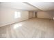 Expansive carpeted basement with natural light at 6323 Willow Branch Way, Plainfield, IN 46168