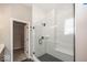 Modern bathroom with glass shower and walk-in closet at 6323 Willow Branch Way, Plainfield, IN 46168