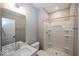 Bathroom featuring sink, toilet, and a shower at 6323 Willow Branch Way, Plainfield, IN 46168