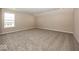 Spacious bedroom with carpeting and large windows at 6323 Willow Branch Way, Plainfield, IN 46168