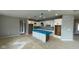 Bright eat-in kitchen with white cabinets, a center island, and pendant lighting fixtures at 6323 Willow Branch Way, Plainfield, IN 46168
