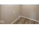 A convenient laundry area with flooring at 6323 Willow Branch Way, Plainfield, IN 46168