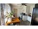 Bright kitchen area with natural light, white cabinetry, and room for a small dining table at 644 S Cole St, Indianapolis, IN 46241
