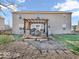A backyard features a pergola with outdoor seating and stone pavers at 6620 Avalon Blvd, Avon, IN 46123