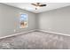 Bedroom with natural light and plush carpeting at 6620 Avalon Blvd, Avon, IN 46123