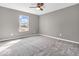 Bright bedroom with natural light from the large window at 6620 Avalon Blvd, Avon, IN 46123