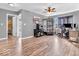 Spacious bedroom with wood floors, a ceiling fan, and a large window at 6620 Avalon Blvd, Avon, IN 46123