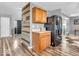 Home entryway area featuring a refrigerator, cabinets, butcher block countertops, and stylish decor at 6620 Avalon Blvd, Avon, IN 46123