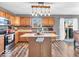 Bright kitchen featuring an island, updated countertops, stylish cabinets and stainless appliances at 6620 Avalon Blvd, Avon, IN 46123