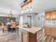 Open kitchen plan featuring an island, breakfast table and access to Gathering room at 6620 Avalon Blvd, Avon, IN 46123
